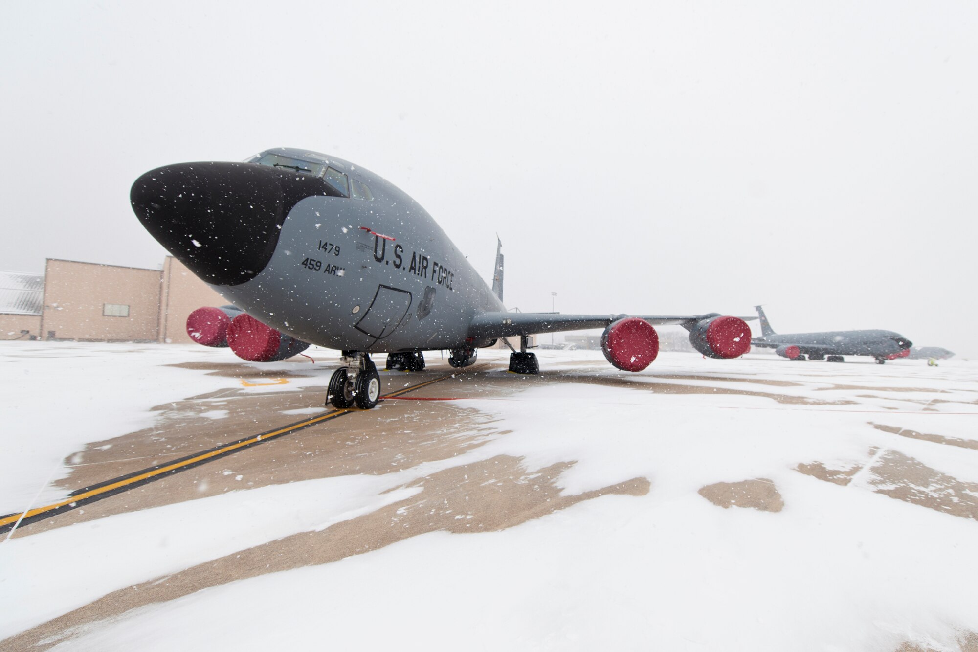 KC-135R Stratotankers with the 459th Air Refueling Wing rest on the Joint Base Andrews, Maryland, flight line during the region's first winter storm of the season Jan. 8, 2017. Up to two inches fell in parts of the National Capital Region during the 459th's drill weekend. (U.S. Air Force photo/Tech. Sgt. Kat Justen)