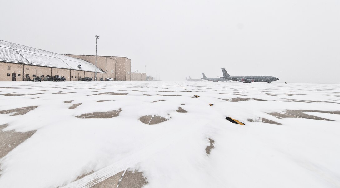KC-135R Stratotankers with the 459th Air Refueling Wing rest on the Joint Base Andrews, Maryland, flight line during the region's first winter storm of the season Jan. 8, 2017. Up to two inches fell in parts of the National Capital Region during the 459th's drill weekend. (U.S. Air Force photo/Tech. Sgt. Kat Justen)