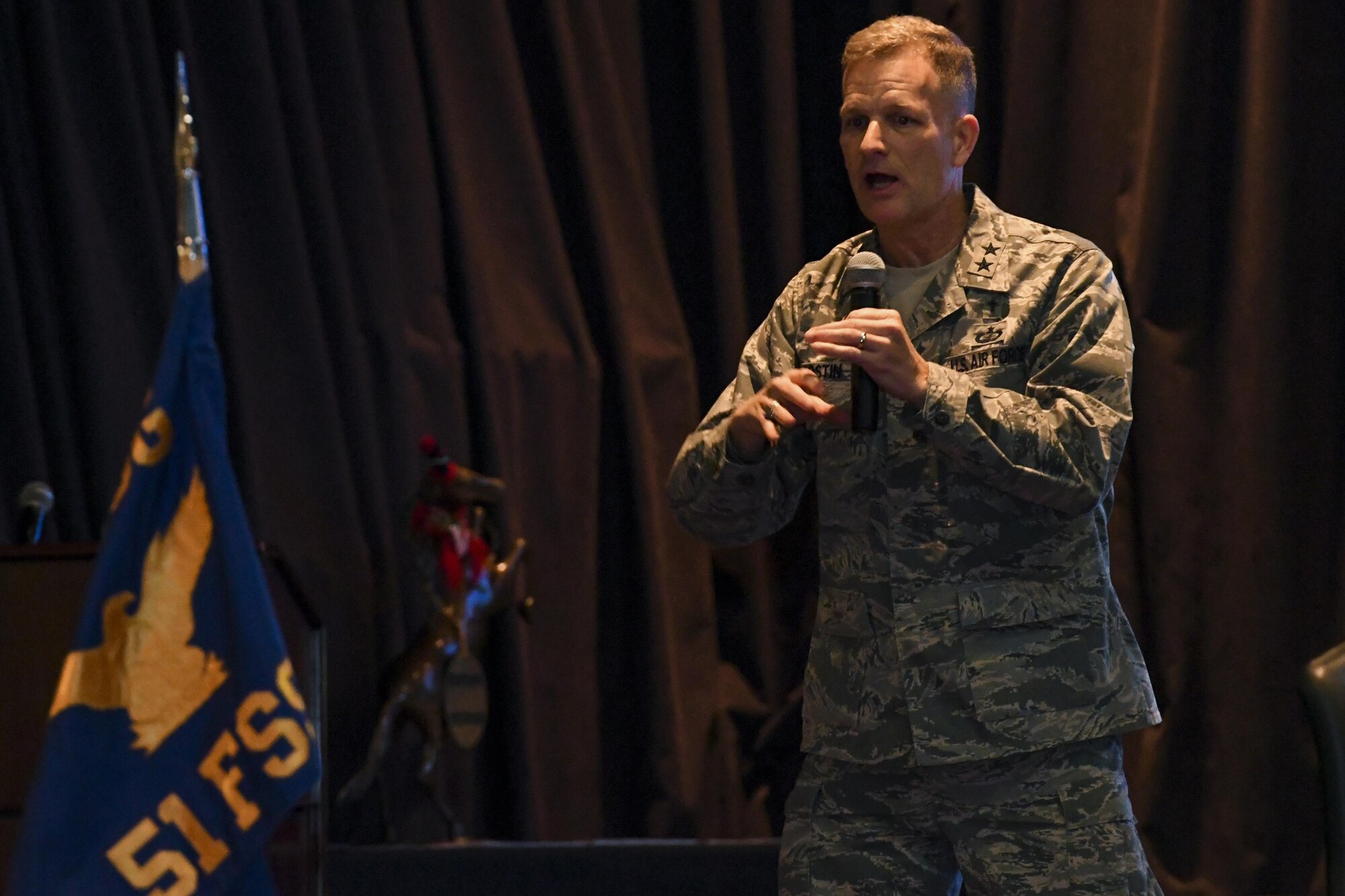 Chap. (Maj. Gen.) Dondi E. Costin, Air Force Chief of Chaplains, speaks to a crowd of Airmen and family members at Osan Air Base, Republic of Korea, Dec. 29, 2016. Costin visited Osan to learn about the challenges faced by Airmen and their families firsthand, while also taking the opportunity to spread his message of resiliency. (U.S. Air Force photo by Senior Airman Victor J. Caputo)