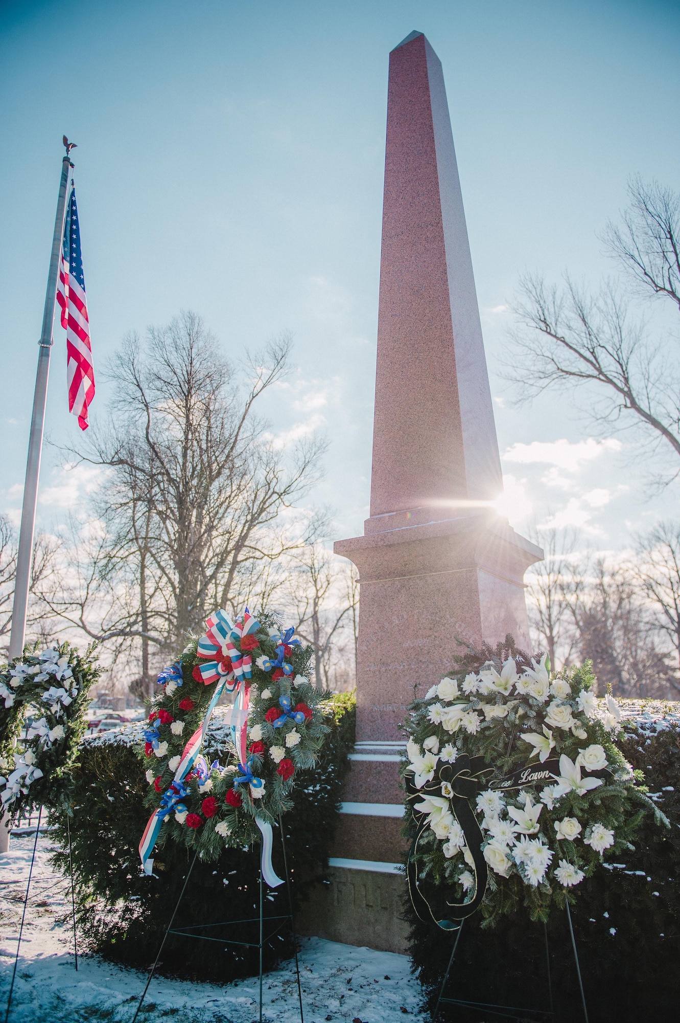 A wreath provided by the White House on behalf of President Barack Obama sits on display at the grave of President Millard Fillmore, Forest Lawn Cemetery, Buffalo, N.Y., Jan. 6, 2017. Col. Gary R. Charlton, vice commander of the 107th Airlift Wing, Niagara Falls Air Reserve Station, presented the wreath at a ceremony held by the University at Buffalo, a school which Fillmore was one of the founders. (U.S. Air Force Photo by Staff Sgt. Ryan Campbell)