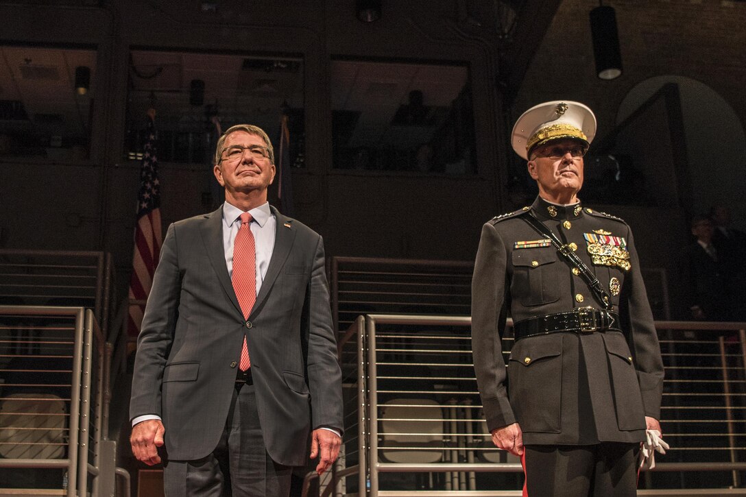 Defense Secretary Ash Carter and Marine Corps Gen. Joe Dunford, chairman of the Joint Chiefs of Staff, attend Carter's farewell ceremony at Joint Base Myer-Henderson Hall, Va., Jan. 9, 2016. DoD photo by Air Force Tech. Sgt. Brigitte N. Brantley