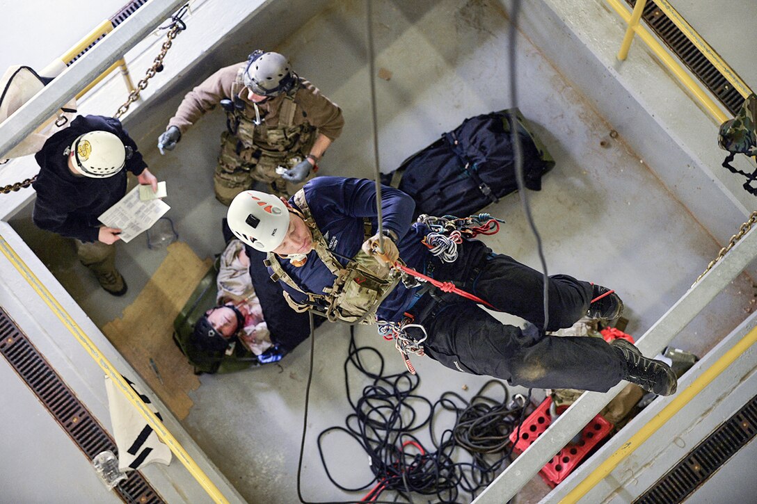 Pararescuemen conduct rescue training in confined spaces at Francis S. Gabreski Air National Guard Base in Westhampton Beach, N.Y., Jan. 8, 2017. Air National Guard photo by Staff Sgt. Christopher S. Muncy