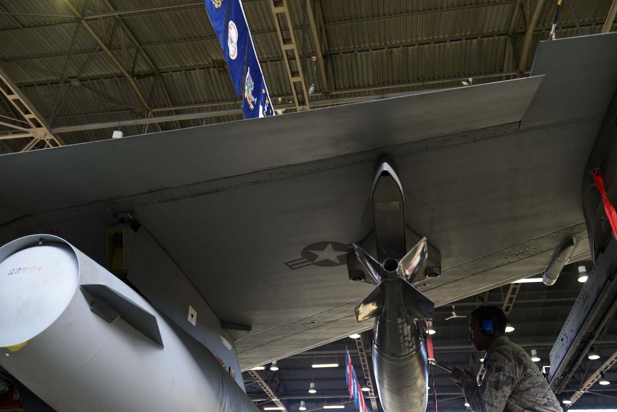U.S. Air Force Airman 1st Class Licinio Monteiro, 52nd Aircraft Maintenance Squadron weapons load
crew member, loads an inert bomb on an F-16 Fighting Falcon during the quarterly weapons load
competition in Hangar One at Spangdahlem Air Base, Germany, Jan. 6, 2017. The competition
consisted of two teams competing against each other to load weapons quickly and accurately. (U.S.
Air Force photo by Staff Sgt. Jonathan Snyder)