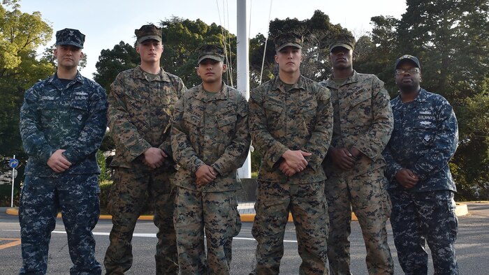 Four U.S. Marines and two Sailors instinctively responded alongside local residents when a vehicle with five passengers fell from the fifth story of a parking garage in Yokosuka, Dec. 31, 2016. Once the Marines arrived on scene, the group collectively flipped the car in order to remove the passengers prior to Japanese Emergency Medical Services arriving. The Marines are assigned to 3rd Battalion, 1st Marine Regiment and forward deployed to 3rd Marine Division, III Marine Expeditionary Force based in Okinawa, Japan. The Sailors are assigned to Commander Fleet Activities Yokosuka. Pictured left to right: Petty Officer 1st Class Garrett Osborne, Lance Cpl. James Flores, Lance Cpl. Manaure Arellano, Pfc. Jacob Boerner, Lance Cpl. Raheem Gilliam and Petty Officer 2nd Class Derhon Finch.