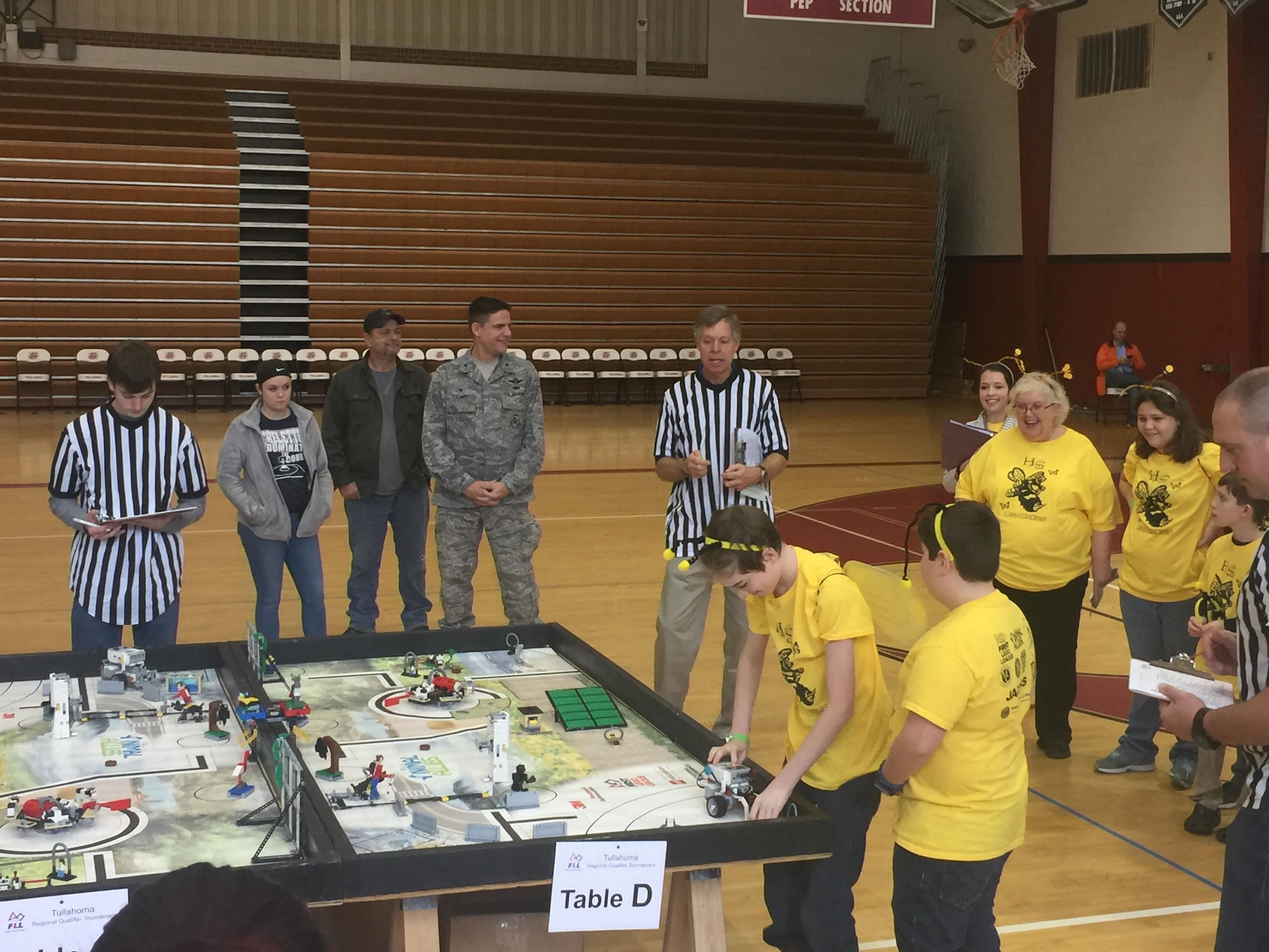 Sean O’Gorman and Jamison Norton (left to right at table), on the LegoTronics team from East Middle School, Tullahoma, prepare their team’s robot to complete a FIRST® LEGO® League (FLL) mission. Twenty-seven teams gathered at Tullahoma High School Dec. 17, 2016, to compete in the FLL Regional Qualifier Tournament.  (U.S. Air Force photo/Holly Peterson)