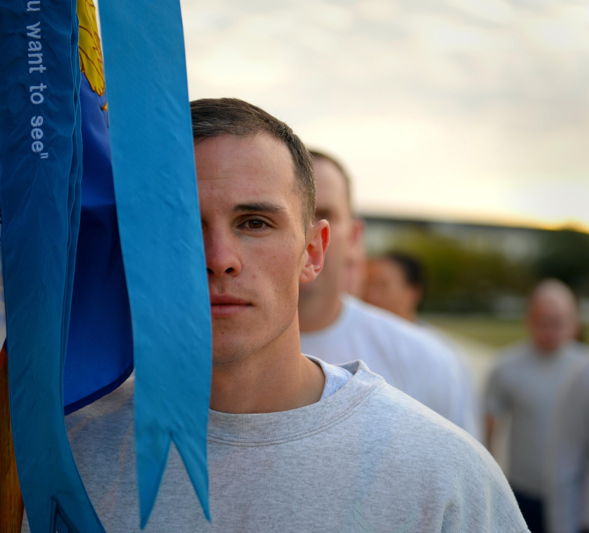 Staff Sgt. Turner Phillips, 81st Training Support Squadron Military Training Leader Course instructor, stands at attention before a formation run during a morning physical training session at the Levitow Training Support Facility drill pad, Dec. 2, 2016, on Keesler Air Force Base, Miss. Throughout the four-week course, students and instructors PT together before the students are evaluated on their ability to lead a PT session with non-prior service Airmen. (U.S. Air Force photo by Senior Airman Duncan McElroy)