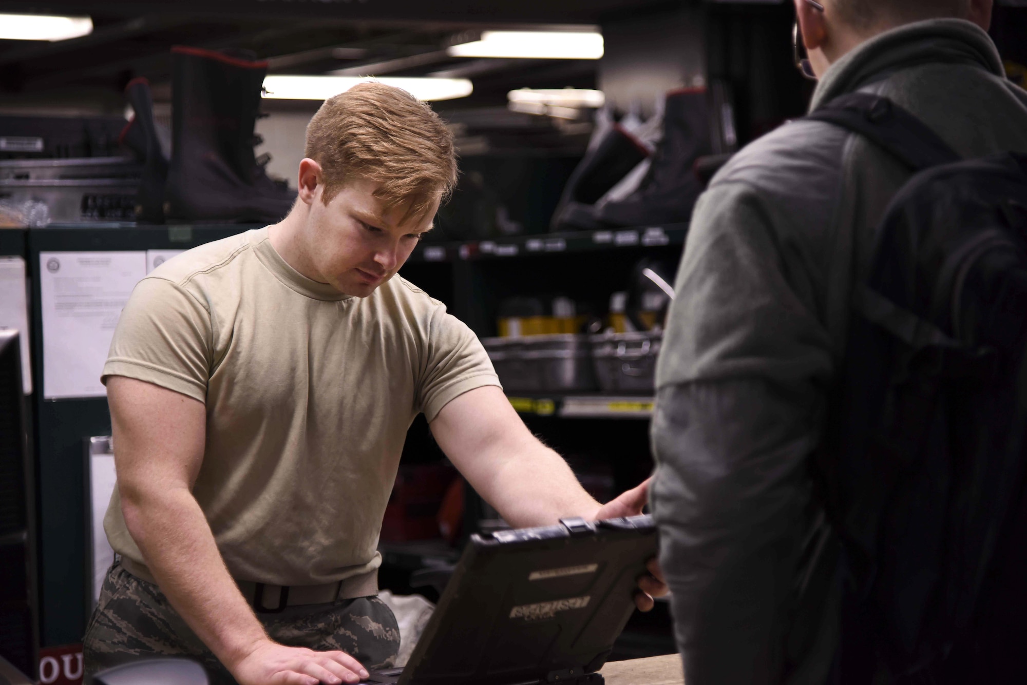 U.S. Air Force Senior Airman Jacob Price, 19th Aircraft Maintenance Squadron tool custodian, inspects a laptop before checking it back into the system Jan. 4, 2017, at Little Rock Air Force Base, Ark. The Composite Tool Kit shop hosts a wide variety of tools as well as directly supports the missions of every maintainer on the flight line. (U.S. Air Force photo by Senior Airman Stephanie Serrano)