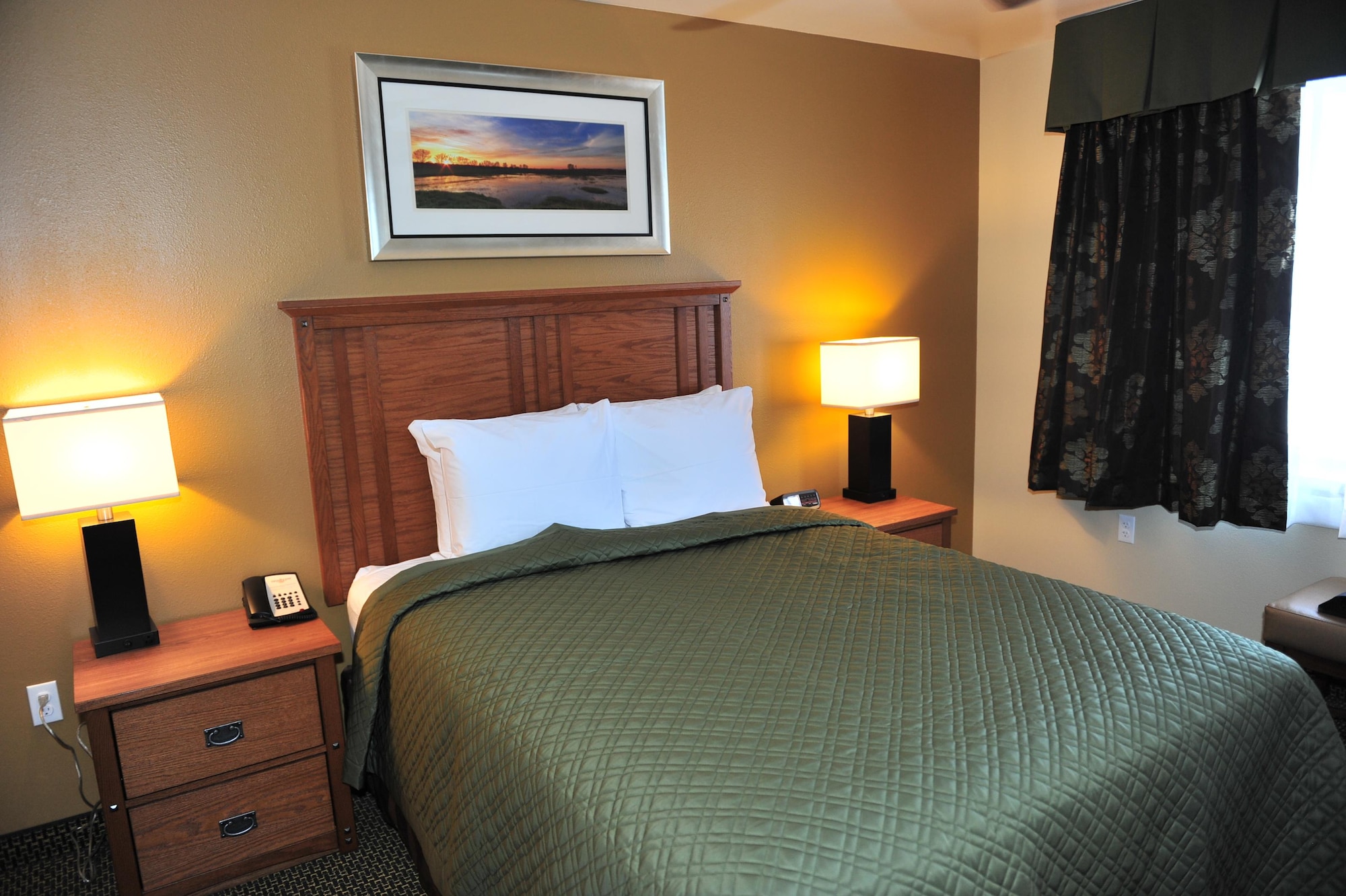 A bedroom from one of the new Temporary Lodging Facility units is displayed at Minot Air Force Base, N.D., Jan. 6, 2017. The $18.9 million facility replaces 44-year-old modular units and includes pet-friendly rooms, and two rooms to accommodate family members who may have mobility issues. (U.S. Air Force photo/Senior Airman Apryl Hall)