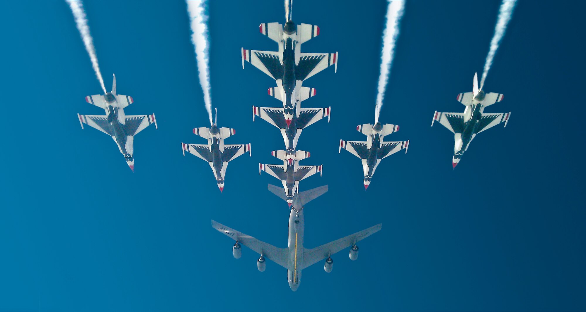 The U.S. Air Force Thunderbirds aerial demonstration team flies in formation behind a Fairchild Air Force Base KC-135r prior to refueling Aug. 8, 2012. The Thunderbirds have operated since 1953 as the USAF "ambassadors in blue" and have demonstrated the Air Force's flying capability across the world. (Courtesy Photo)