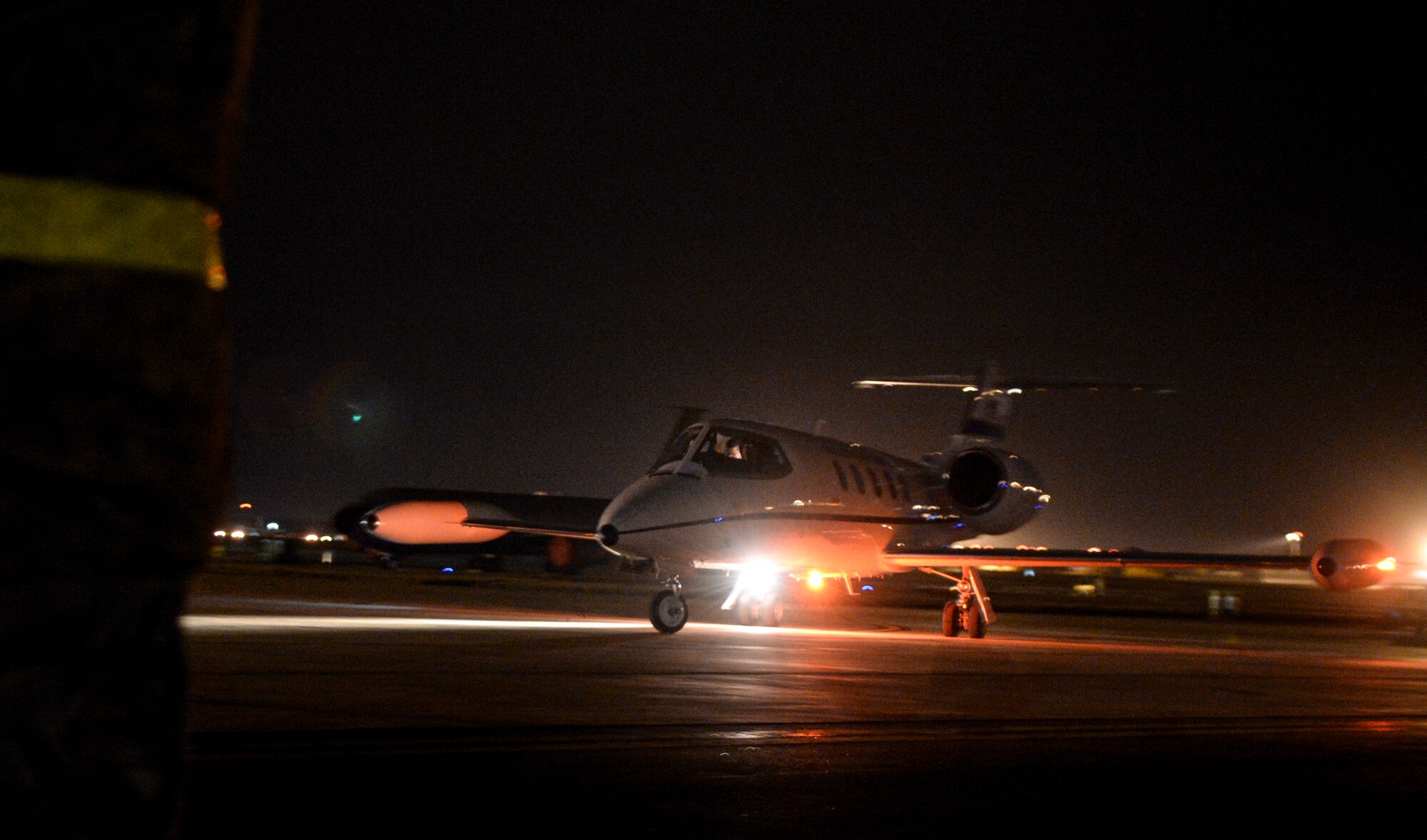 A C-21 Learjet taxies on the flightline Jan. 5, 2016, on RAF Mildenhall, England. The jet carried U.S. Air Force Lt. Gen. Richard Clark, 3rd Air Force commander, U.S. Air Force Chief Master Sgt. Phillip Easton, 3rd Air Force command chief, along with their spouses. (U.S. Air Force photo by Airman 1st Class Tenley Long)