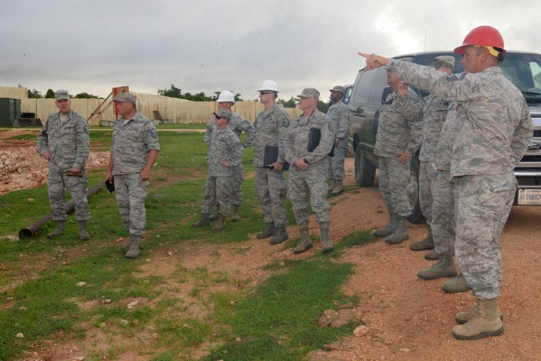 U.S. Air Force Airmen assigned to the 181st Intelligence Wing Civil Engineering Squadron arrive at the job site at Andersen AFB, Guam, July 13, 2016. The 181st engineers provided contingency related hands-on training for Air National Guard CE Airmen. (U.S. Air National Guard photo by Senior Airman Lonnie Wiram)