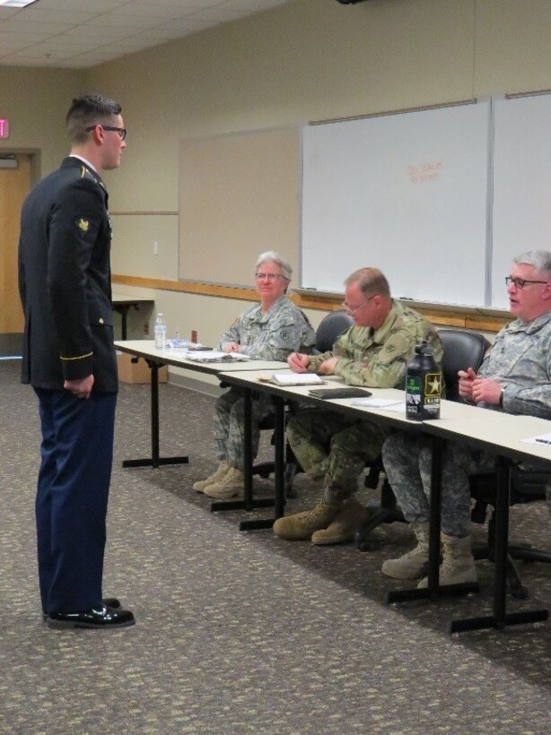 U.S. Army Reserve Spc. Jordan Neiman, from Headquarters and Headquarters Company, 647th Regional Support Group, listens to questions asked by a sergeant major board hoping to respond correctly in order to obtain competitive points during the 647th RSG’s Best Warrior Competition on Fort Bliss, Texas, Jan. 6-8, 2017.  (U.S. Army Reserve photo by Maj. Amabilia G. Payen)