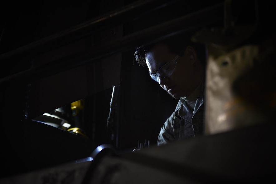 An Air Commando with the 27th Special Operations Maintenance Squadron’s Aircraft Structural Maintenance shop repairs a CV-22 Osprey tilt-rotor aircraft November 16, 2016 at Cannon Air Force Base, N.M. Aircraft structural maintainers are part of a large group of Cannon Air Commandos who work through the night to keep aircraft flying. (U.S. Air Force Photo by Senior Airman Shelby Kay-Fantozzi/released) 