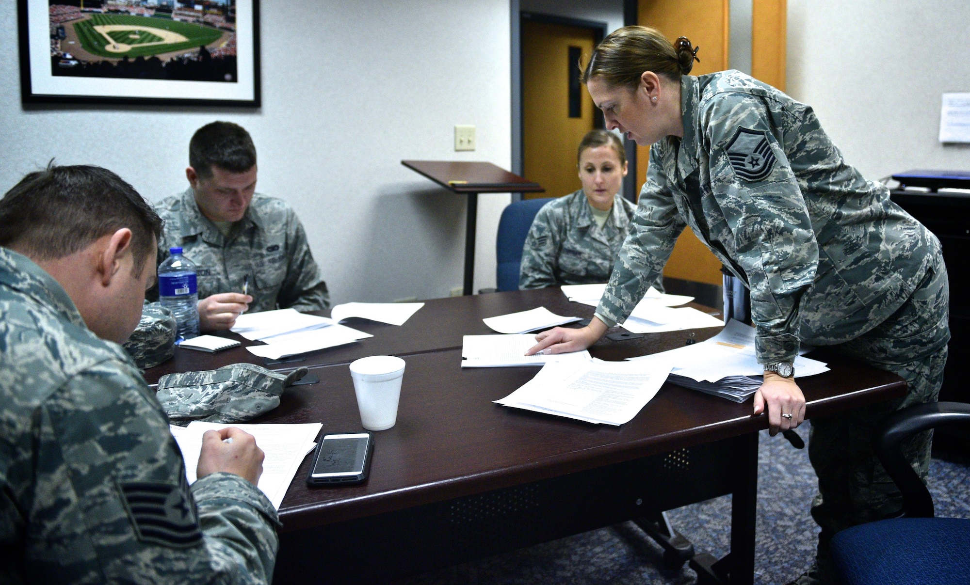Master Sgt. Tabetha Coley, a line recruiter for the 932nd Airlift Wing, teaches an intro to Enlisted Performance Report (EPR) bullet writing class, Jan. 8, 2017, Scott Air Force Base, Illinois.  Coley was an instructor for Airman Leader School for five years and used both her knowledge from teaching but also as an Air Force recruiter to help 932nd Airman write more professionally crafted EPRs.  "As recruiters we want to continue to invest in our people that are in the unit and not just focus on new recruits," said Coley.  She feels she was selected to teach because of her own belief that you find a good mentor or subject matter expert and latch on to them.  (U.S. Air Force photo by Tech. Sgt. Christopher Parr)