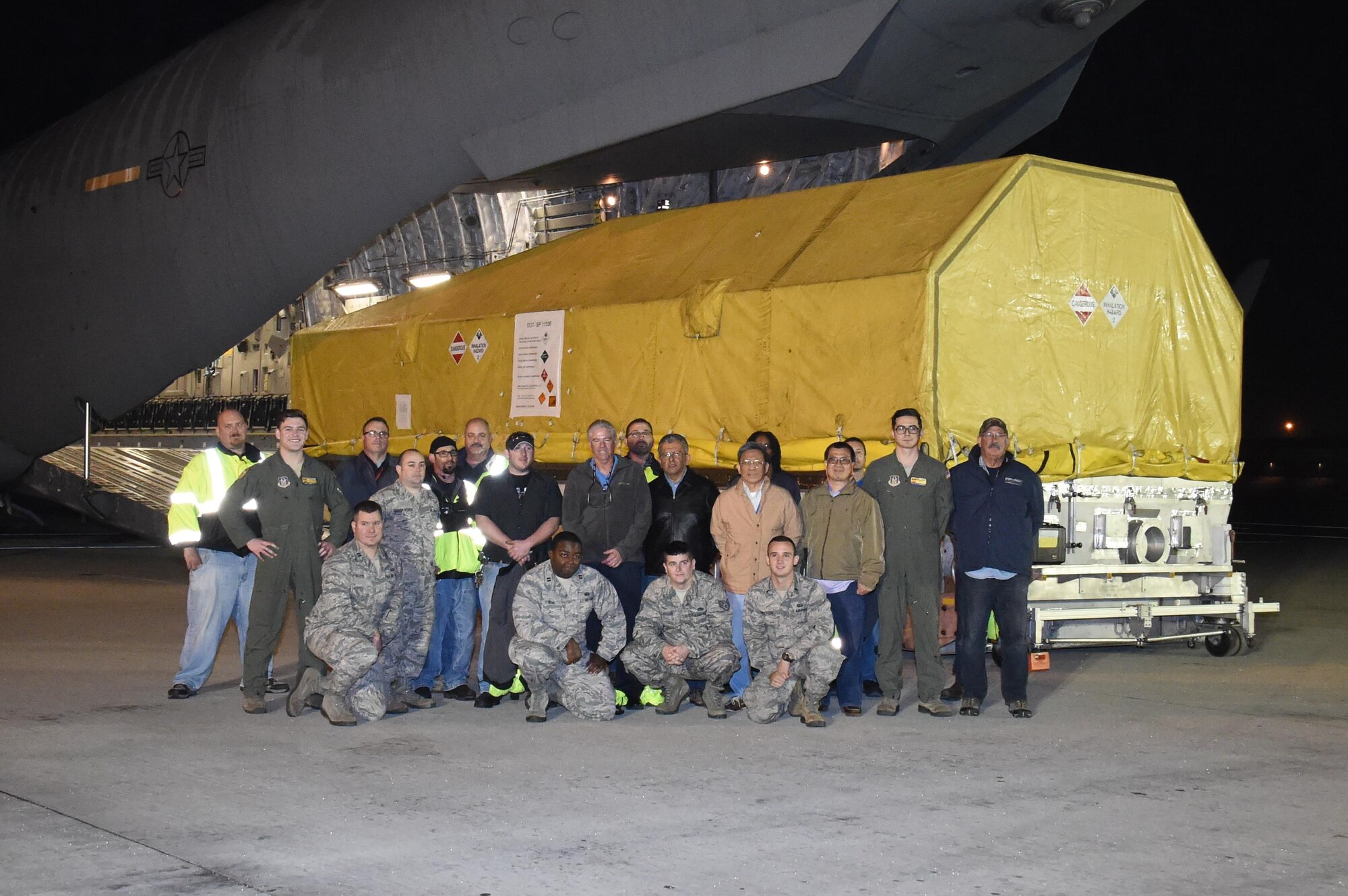 The ninth Wideband Global SATCOM (WGS-9), satellite is transported from the Boeing facility in El Segundo to LAX for delivery via an Air Force C-17 Globe Master, to Cape Canaveral Air Force Station, Florida, Jan, 9.  WGS-9 will provide additional communications capabilities to both U.S. forces and international partners after undergoing final processing, encapsulation, and transport to the launch pad.  (U. S. Air Force photo/ Joseph M. Juarez Sr.)