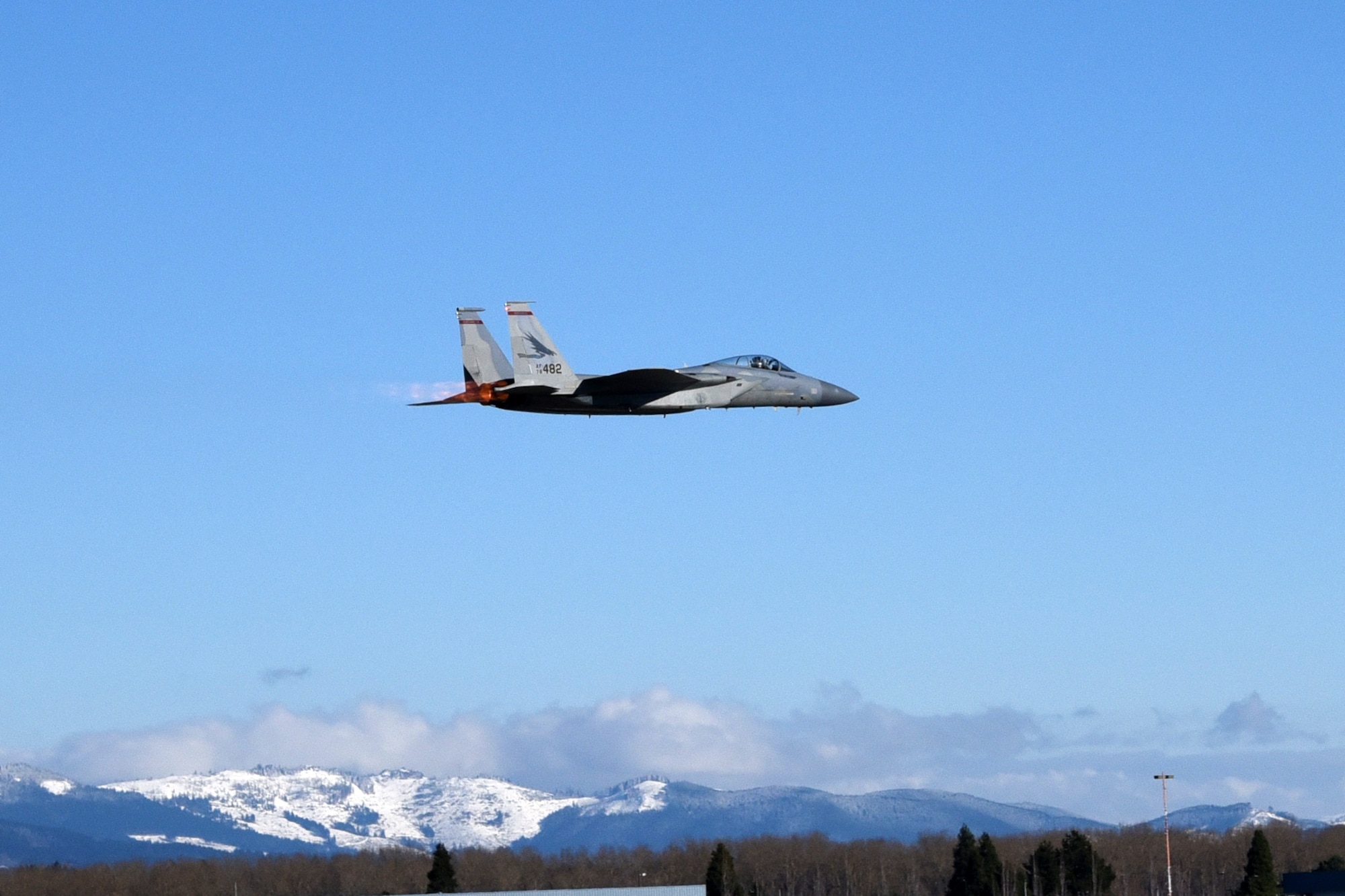 Lt. Col. Paul Shamy, 123rd Fighter Squadron, takes to flight in F-15C Eagle 78-482 for its first training mission with a new wing, Portland Air National Guard Base, Ore., Jan. 3, 2017. (U.S. Air National Guard photo by Senior Master Sgt. Shelly Davison, 142nd Fighter Wing Public Affairs)
