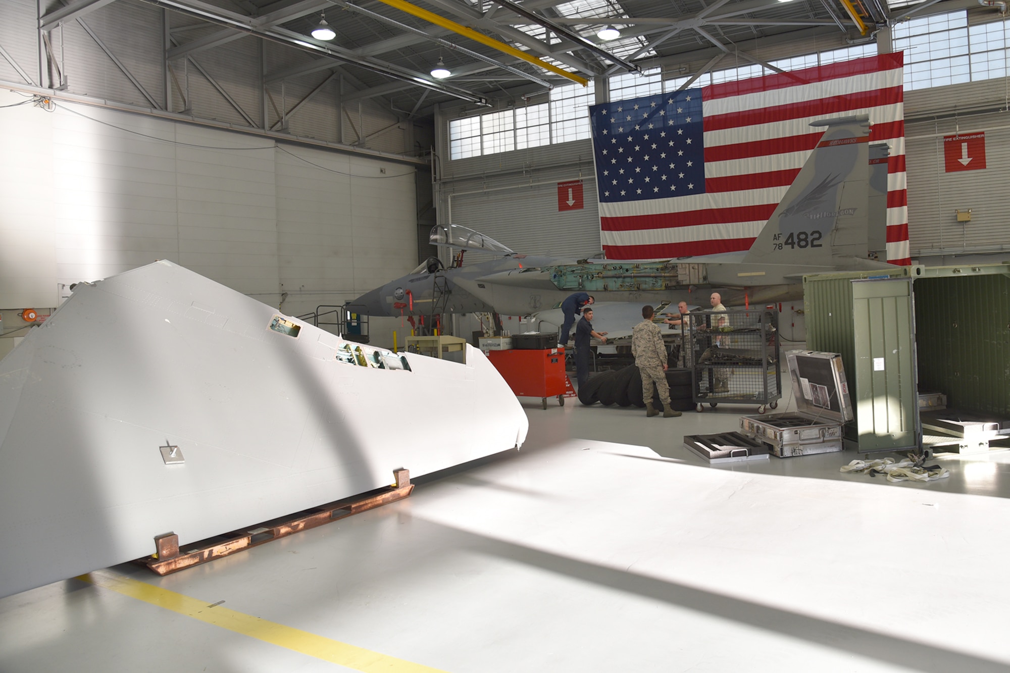 The Depot Field Team from the 402nd Aircraft Maintenance Group, Robins Air Force Base, Ga., prepares an F-15C Eagle assigned to the 142nd Fighter Wing, Portland Air National Guard Base, Ore., for a new wing, Dec. 6, 2016. (U.S. Air National Guard photo by Senior Master Sgt. Shelly Davison, 142nd Fighter Wing Public Affairs)