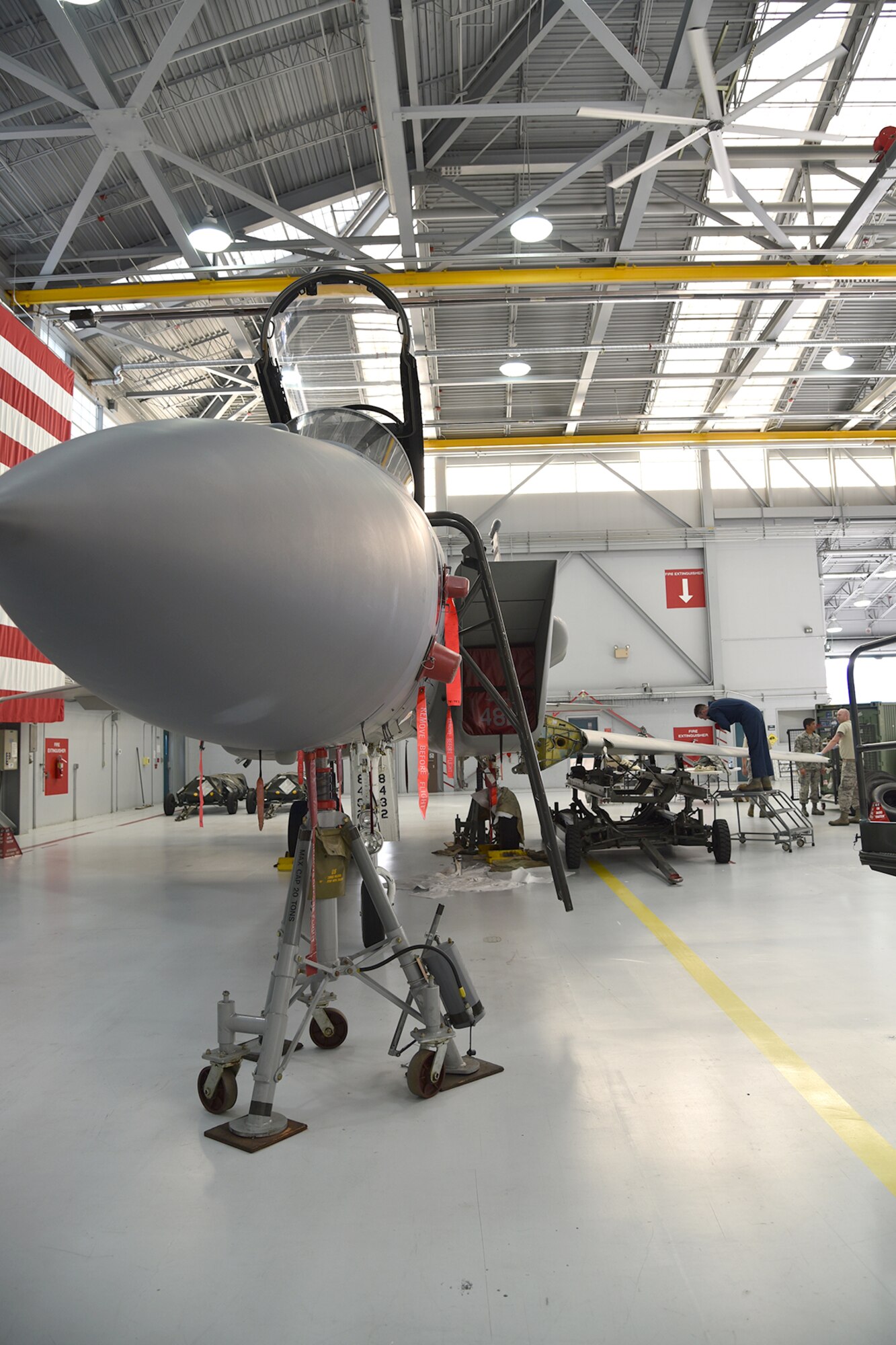 The Depot Field Team from the 402nd Aircraft Maintenance Group, Robins Air Force Base, Ga., prepares an F-15C Eagle assigned to the 142nd Fighter Wing, Portland Air National Guard Base, Ore., for a new wing, Dec. 6, 2016. (U.S. Air National Guard photo by Senior Master Sgt. Shelly Davison, 142nd Fighter Wing Public Affairs)