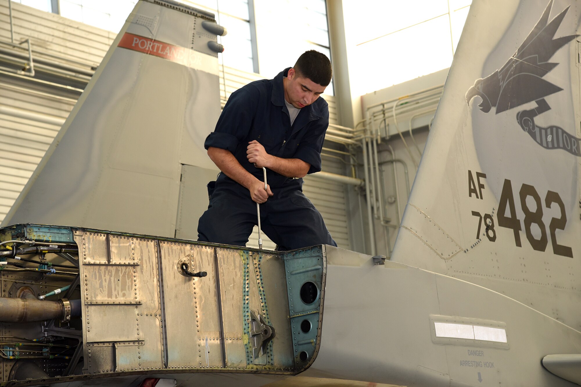 The Depot Field Team from the 402nd Aircraft Maintenance Group, Robins Air Force Base, Ga., prepares an F-15C Eagle assigned to the 142nd Fighter Wing, Portland Air National Guard Base, Ore., for a new wing, Dec. 6, 2016. (U.S. Air National Guard photo by Senior Master Sgt. Shelly Davison, 142nd Fighter Wing Public Affairs)