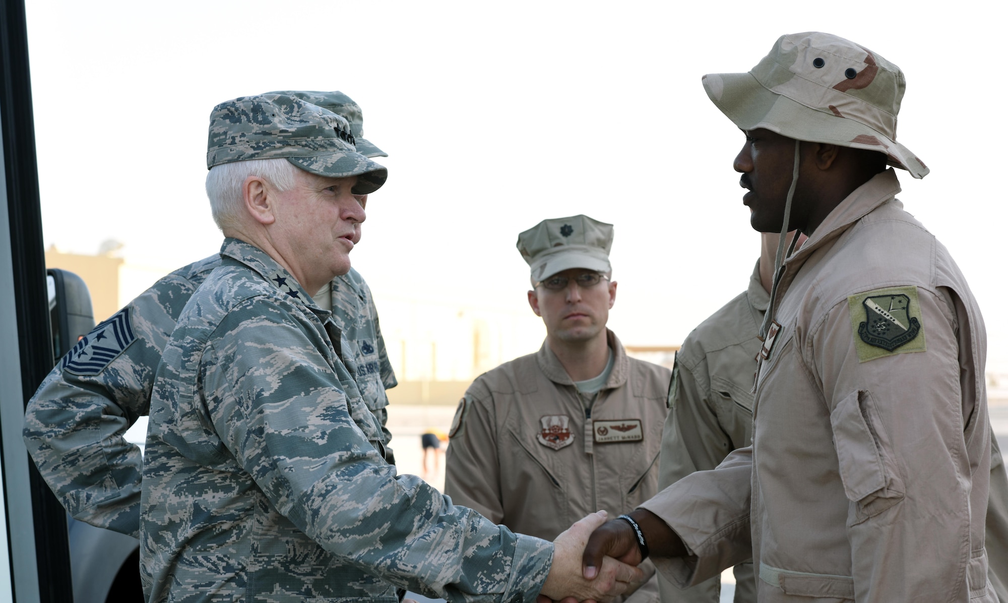 U.S. Air Force Lt. Gen. L. Scott Rice, director of the Air National Guard, shakes hands with Airmen with the 340th Expeditionary Air Refueling Squadron at Al Udeid Air Base, Qatar, Jan. 4, 2016. Rice expressed his gratitude for those serving in the deployed environment and for their continued patriotism. (U.S. Air Force photo by Senior Airman Cynthia A. Innocenti)