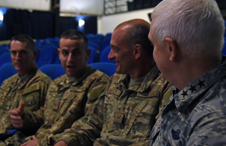 U.S. Air Force Lt. Gen. L. Scott Rice, director of the Air National Guard, converses with guardsmen before speaking at an all call at Al Udeid Air Base, Qatar, Jan. 4, 2016. During his speech, Rice explained the importance of continuing with the total force mindset. (U.S. Air Force photo by Senior Airman Cynthia A. Innocenti)