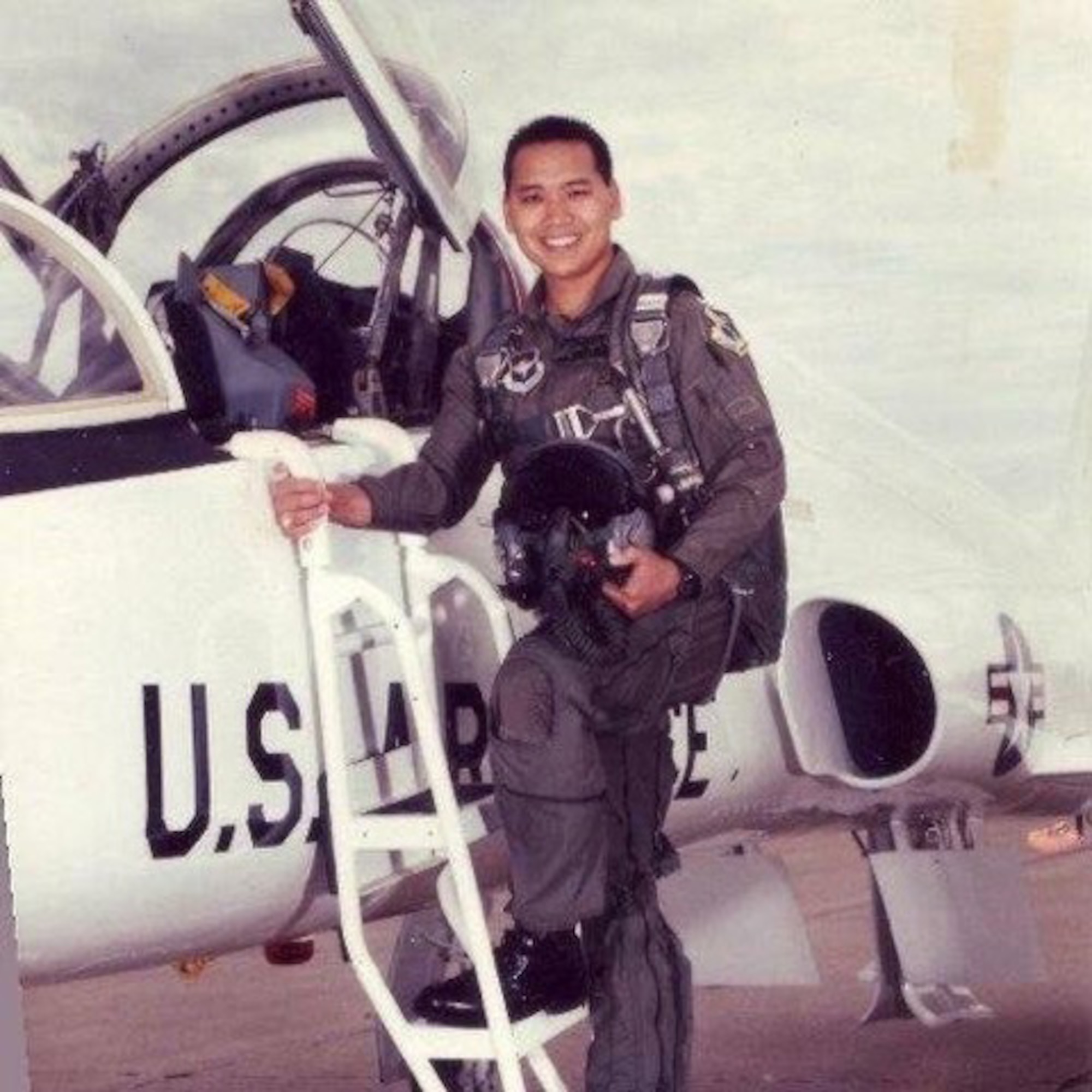 U.S. Air Force Col. Jimmy Canlas, 437th Airlift Wing commander, poses for his pilot training graduation photo at Laughlin Air Force Base, Texas, in July, 1994. Because few Asian Americans were pilots at the time, something as small as his oxygen mask made Canlas stand out. Since the bridge of his nose is wider than most, the instructors had to give him an older, obsolete model. Now more than 20 years later, Canlas attended the first ever Asian American and Pacific Islander forum sponsored by Presidential Commission in Washington, D.C., Dec. 5, 2016 to help continue valuable mentorship for other Asian American men and women serving in the military. 