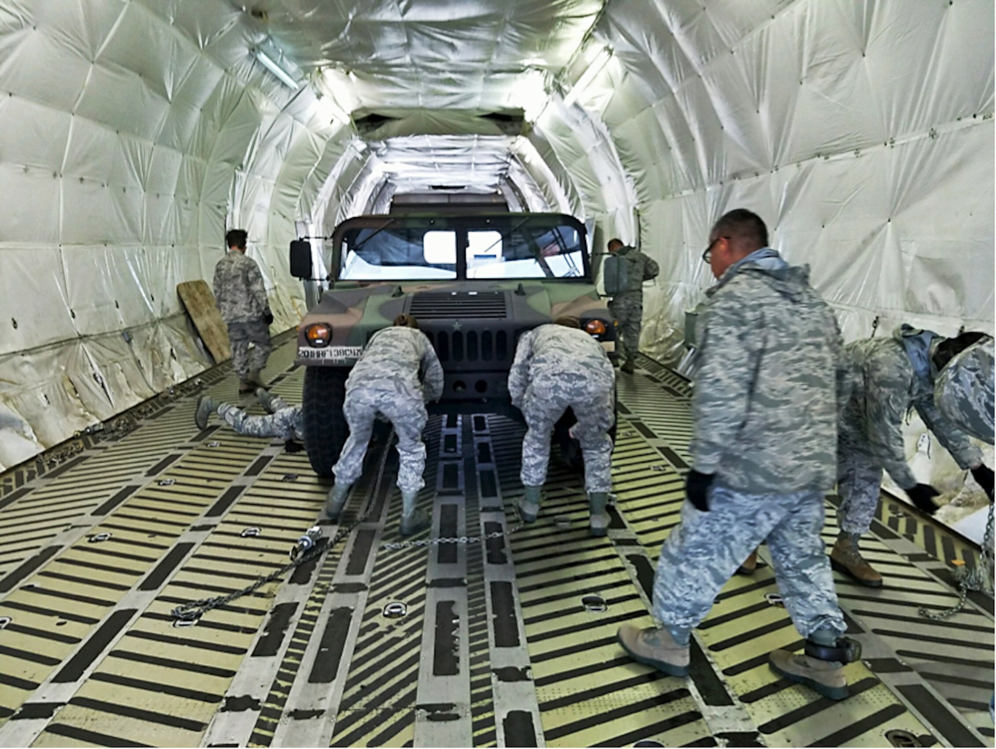 A group of 19 Aerial Port personnel from the 38th Aerial Port Squadron board a C-17 on cool brisk morning at Joint Base Charleston, South Carolina. The destination is a short flight to Dobbins Air Reserve Base, home of the Air Transportation Proficiency Center and Deployment Readiness Training. The ATPC’s goal is to train Reserve Airman in the Air Transportation career field to be proficient in their career field. (Courtesy photo)