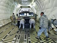 A group of 19 Aerial Port personnel from the 38th Aerial Port Squadron board a C-17 on cool brisk morning at Joint Base Charleston, South Carolina. The destination is a short flight to Dobbins Air Reserve Base, home of the Air Transportation Proficiency Center and Deployment Readiness Training. The ATPC’s goal is to train Reserve Airman in the Air Transportation career field to be proficient in their career field. (Courtesy photo)