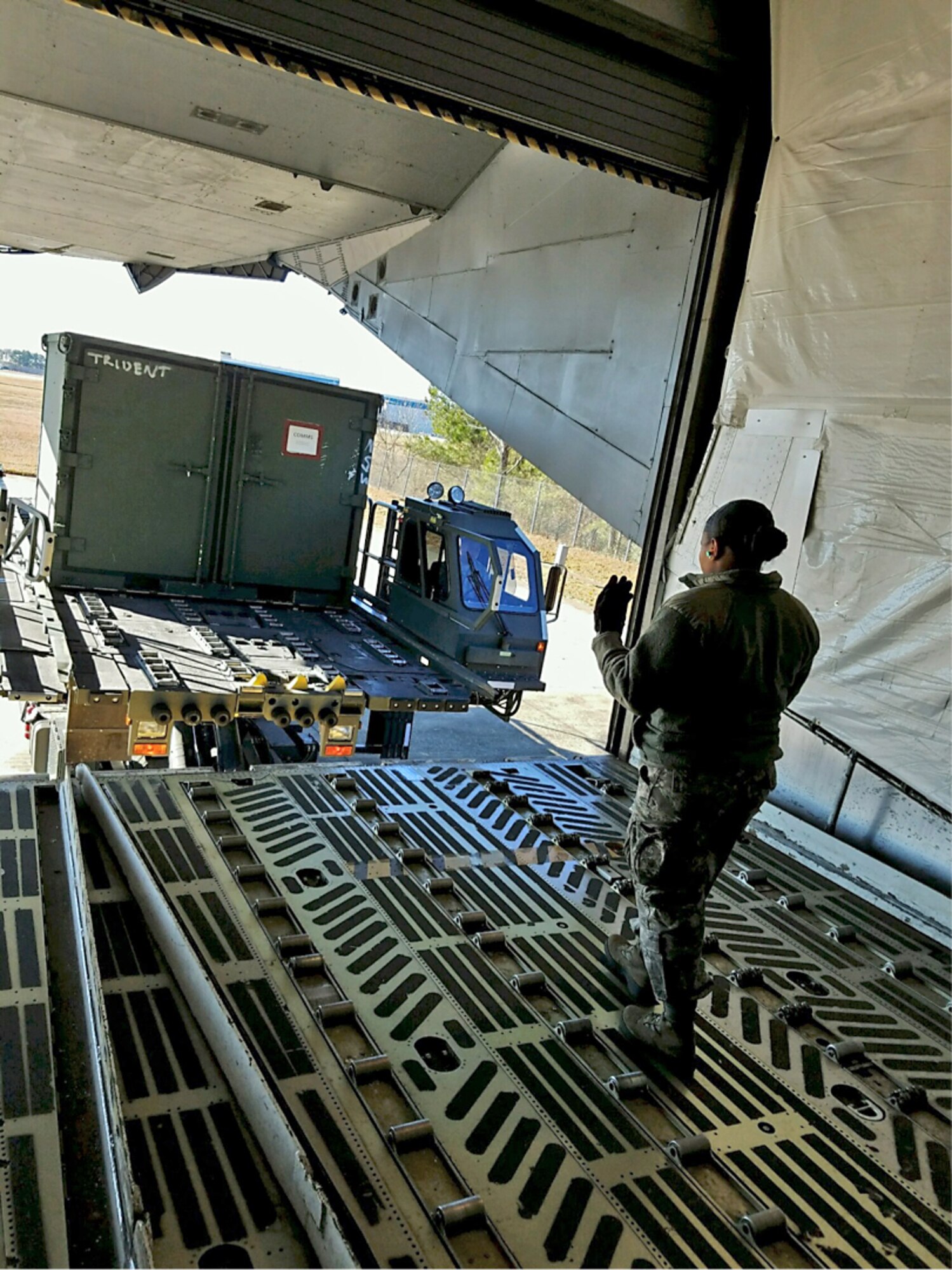 A group of 19 Aerial Port personnel from the 38th Aerial Port Squadron board a C-17 on cool brisk morning at Joint Base Charleston, South Carolina. The destination is a short flight to Dobbins Air Reserve Base, home of the Air Transportation Proficiency Center and Deployment Readiness Training. The ATPC’s goal is to train Reserve Airman in the Air Transportation career field to be proficient in their career field. (Courtesy photo)