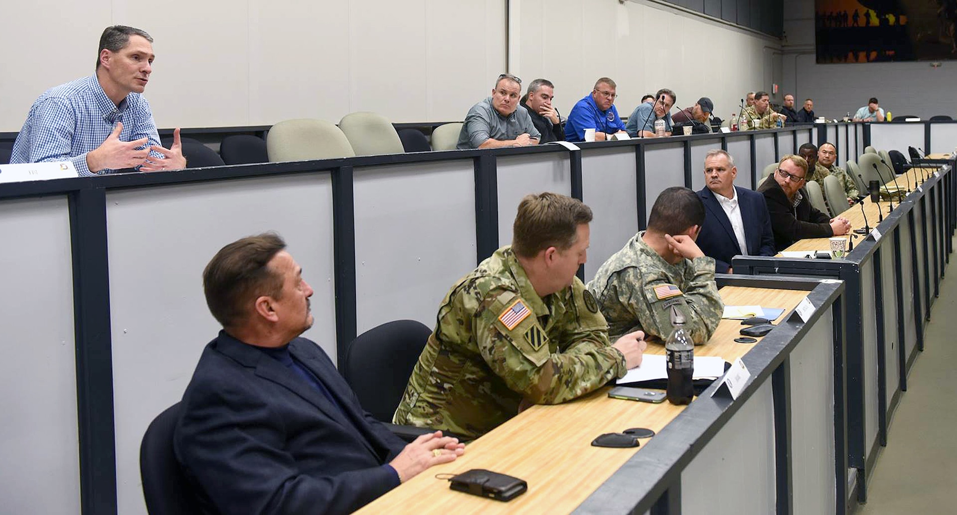 (Top, far left) Dr. Bradley Poppen, an operational psychologist with the FBI’s office of victim assistance working at the hostage recovery fusion cell, makes comments during a reintegration presentation Jan. 10. Poppen, a retired Army colonel, is a survival evasion resistance and escape psychologist who is sharing his expertise during U.S. Army South’s rehearsal of concept drill at Joint Base San Antonio-Fort Sam Houston.