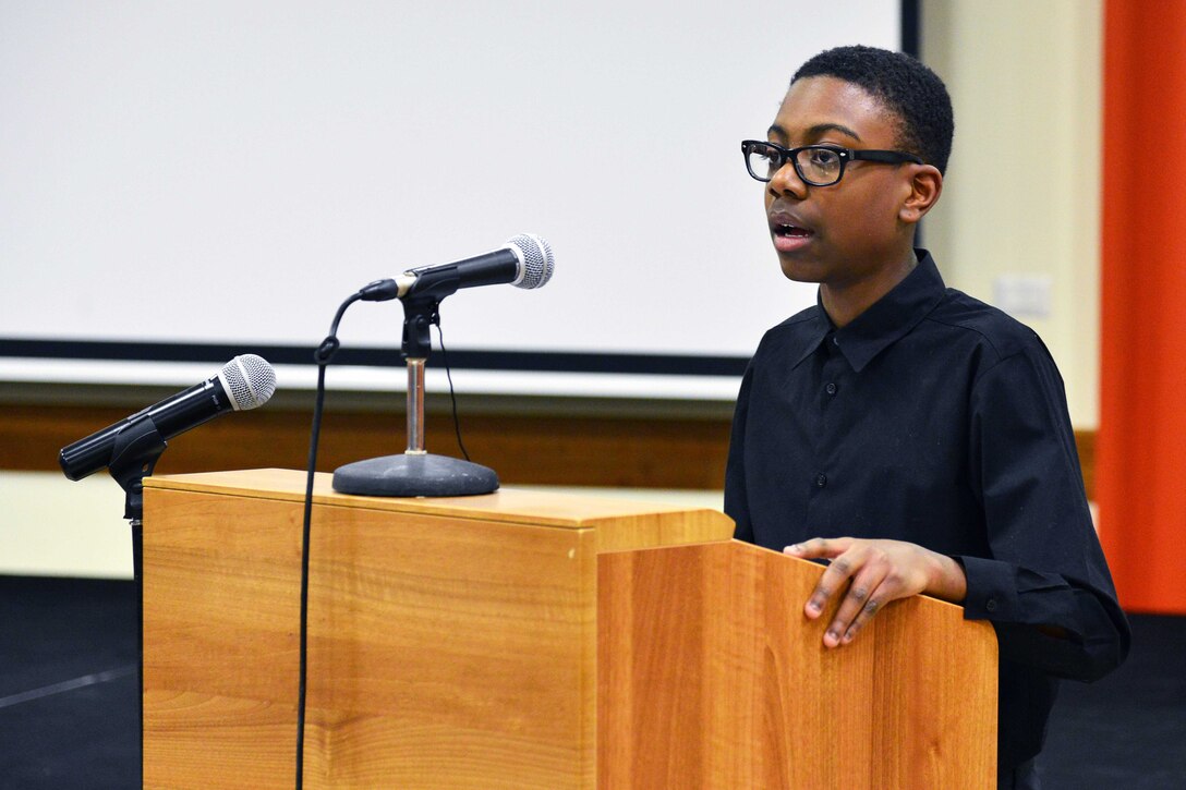 Anthony Malik Thompson of Vicenza High School, recites quotes from Dr. Martin Luther King Jr. at Caserma Ederle, Vicenza, Italy, Jan. 10, 2017. Army photo by Paolo Bovo