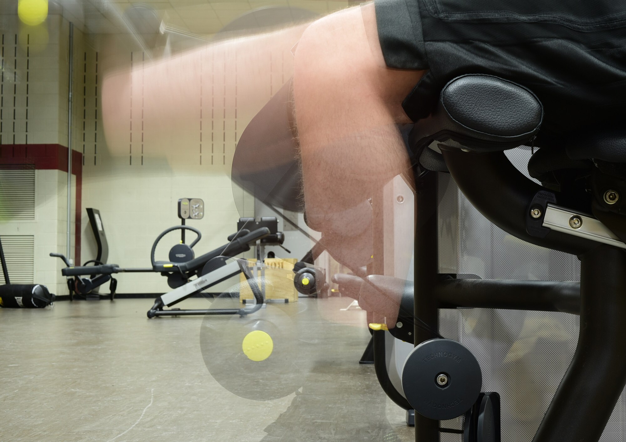 An Ellsworth Airmen uses a leg machine at the Bellamy Fitness Center at Ellsworth Air Force Base, S.D. Jan. 9, 2017. The fitness center is open 24 hours a day, allowing all shifts and schedules an opportunity to stay fit in the New Year. (U.S. Air Force photo by Airman 1st Class James L. Miller)