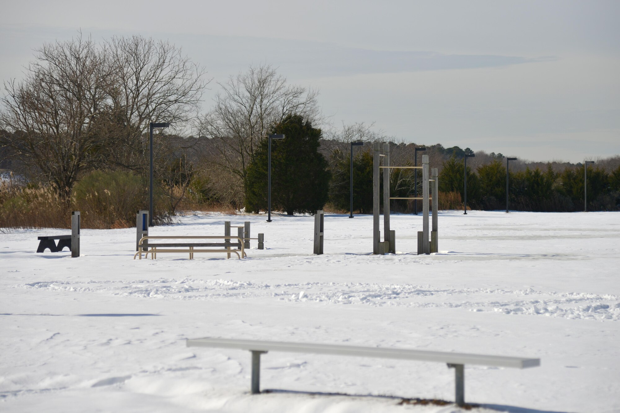 Snow covers the Shellbank Fitness Center track after winter storm Helena at Joint Base Langley-Eustis, Va., Jan. 10, 2017. The Hampton Roads region received several inches of snow with some areas receiving up to a foot. (U.S. Air Force photo by Airman 1st Class Tristan Biese)