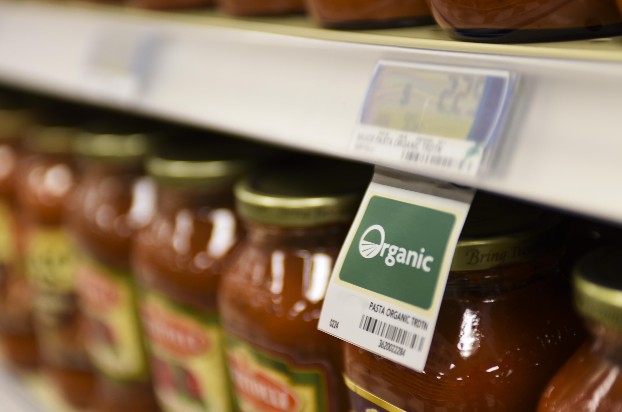 A row of products are marked with an “organic” label inside the commissary at Ellsworth Air Force Base, S.D., on Jan. 11, 2016. The Defense Commissary Agency implemented a new Nutrition Guide Program by labeling certain foods that are low sodium, no-added sugar, high fiber, whole grain and organic with color-coded shelf tags. Dietitian approved, these labels are designed to help customers locate healthy options faster – saving time and hassle. (U.S. Air Force illustration by Airman 1st Class Randahl J. Jenson)