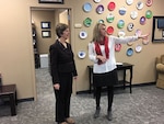 Mrs. Laura Hyten (left), wife of U.S. Strategic Command commander Gen. John Hyten, toured Army Community Services at Redstone Arsenal with Survivor Outreach Services coordinator Kerrie Branson to learn about the resources available to assist military families.