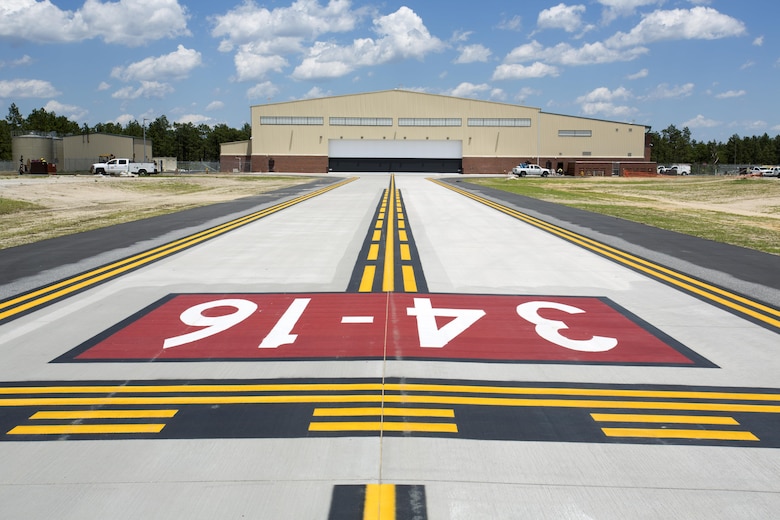 An aircraft runway at Camp Mackall leads to its newest resident, an Unmanned Aerial Systems hangar, constructed to house the UAS MQ-1C Gray Eagle. The facility, built by Caddell Construction, won the state and national-level Associated Builders and Constractors, Inc. Excellence in Construction Competition in December 2016. It also received state-level honors from the Associated General Contractors of America.