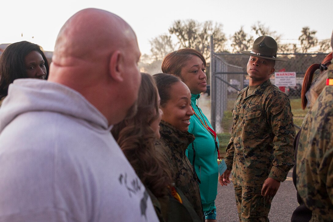 Educators and influencers from the Orlando area stand in formation as they prepare to head to the next event aboard Marine Corps Recruit Depot Parris Island, South Carolina, January 11, 2017. The educators come from both Recruiting Station Fort Lauderdale and Recruiting Station Orlando to experience what is called the Educators Workshop. The Educators Workshop provides the opportunity for educators to have an inside look at Marine Corps training to better inform their students in their local area. (Photo by Cpl. John-Paul Imbody/Released)