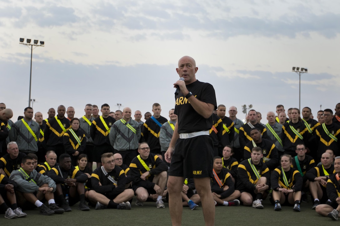 U.S. Army Reserve Commanding General Lt. Gen. Charles D. Luckey speaks with Soldiers from the 316th Sustainment Command (Expeditionary), an U.S. Army Reserve unit from Coraopolis, Pa., after a 5K at Camp Arifjan, Kuwait, Jan. 10, 2017. Luckey spoke with Soldiers about the capabilities, need and importance of their missions overseas. The 316th ESC mission in Kuwait is to support the 1st Sustainment Command (Theater) mission of providing logistics support throughout the U.S. Central Command area of operations. (U.S. Army Photo by Staff Sgt. Dalton Smith)