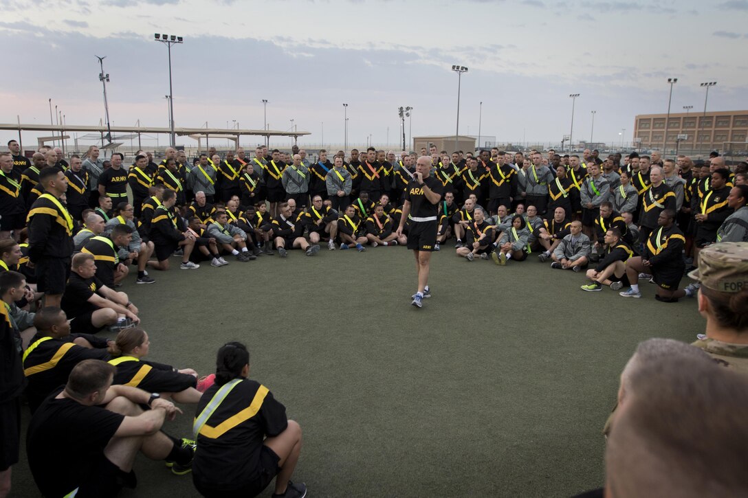 U.S. Army Reserve Commanding General Lt. Gen. Charles D. Luckey speaks with Soldiers from the 316th Sustainment Command (Expeditionary), an U.S. Army Reserve unit from Coraopolis, Pa., after a 5K at Camp Arifjan, Kuwait, Jan. 10, 2017. Luckey spoke with Soldiers about the capabilities, need and importance of their missions overseas. The 316th ESC mission in Kuwait is to support the 1st Sustainment Command (Theater) mission of providing logistics support throughout the U.S. Central Command area of operations. (U.S. Army Photo by Staff Sgt. Dalton Smith)