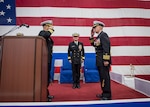 Capt. George B. Doyon, left, relieves Capt. Marvin E. Thompson as commander, Amphibious Squadron (PHIBRON) 11 during a change of command ceremony aboard amphibious assault ship USS Bonhomme Richard (LHD 6), Jan. 9, 2017. The ship is forward-deployed to Sasebo, Japan, providing rapid-response capability in the event of a regional contingency or natural disaster. 