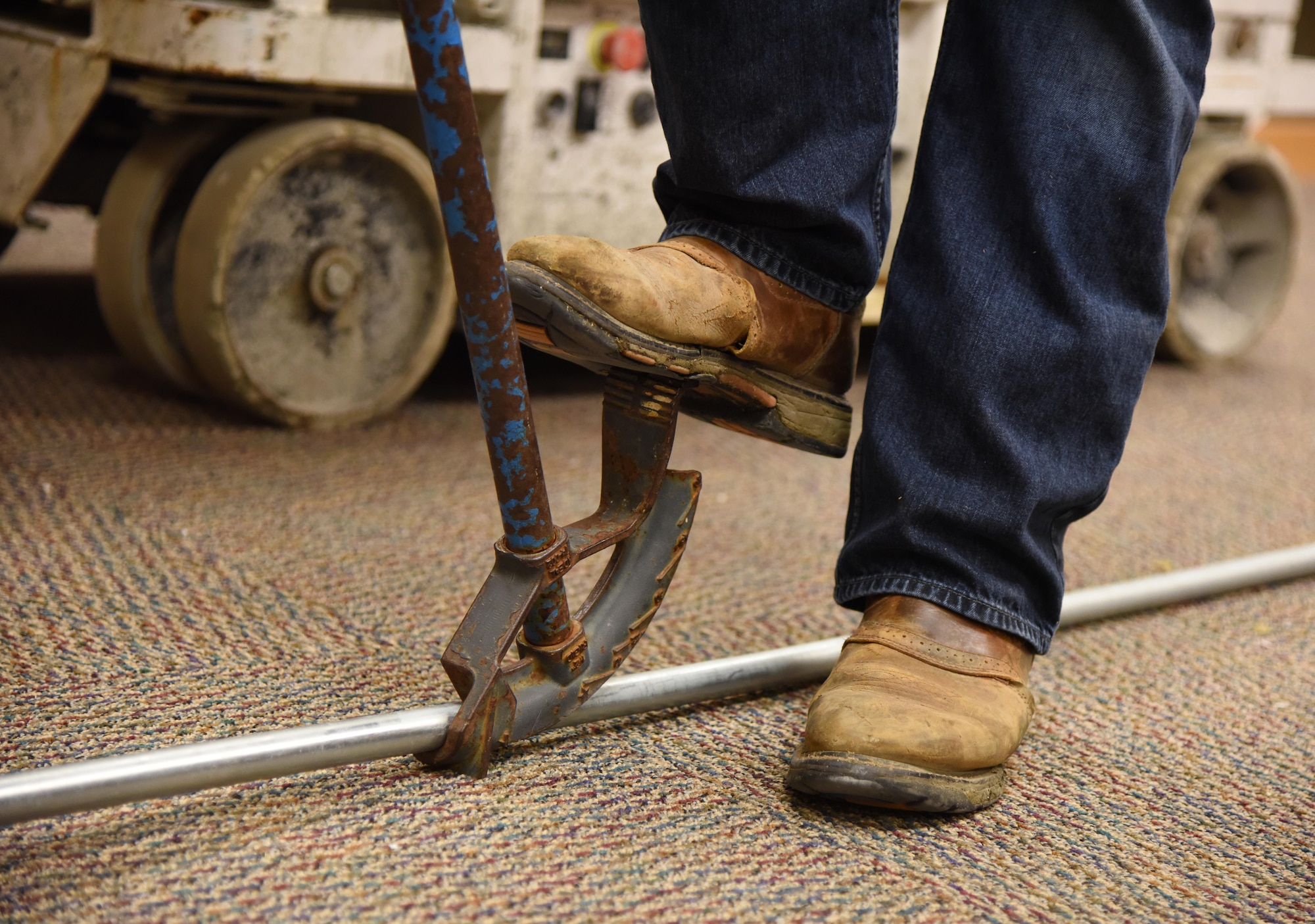 Shawn Ahern, DNP Inc. electrician, bends a piece of conduit at the McBride Commons Jan. 6, 2017, on Keesler Air Force Base, Miss. The McBride Commons renovation project will transition the former base library into a common area which will include a children’s library, computer stations, engraving, framing, marketing and print shops and a full kitchen. The nine-month project is expected to be complete by May 2017. (U.S. Air Force photo by Kemberly Groue) 