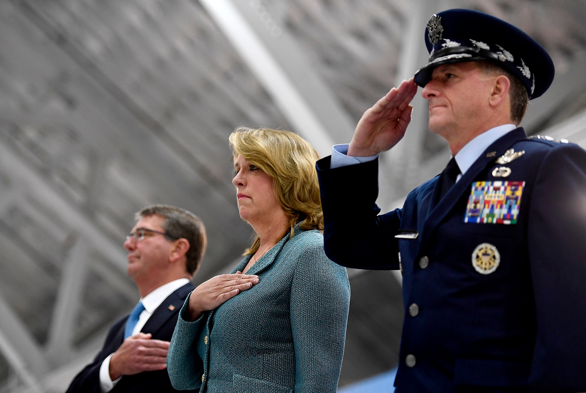 Secretary of the Air Force Deborah Lee James stands for the national anthem with Air Force Chief of Staff Gen. David L. Goldfein and Secretary of Defense Ash Carter, during her farewell ceremony at Joint Base Andrews, Md., Jan. 11, 2017.  James took office as the 23rd secretary of the Air Force in December 2013. (U.S. Air Force photo/Scott M. Ash)