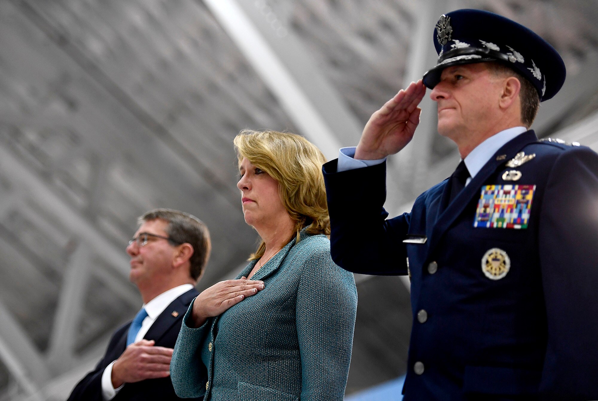 Secretary of the Air Force Deborah Lee James stands for the national anthem with Air Force Chief of Staff Gen. David L. Goldfein and Secretary of Defense Ash Carter, during her farewell ceremony at Joint Base Andrews, Md., Jan. 11, 2017.  James took office as the 23rd secretary of the Air Force in December 2013. (U.S. Air Force photo/Scott M. Ash)