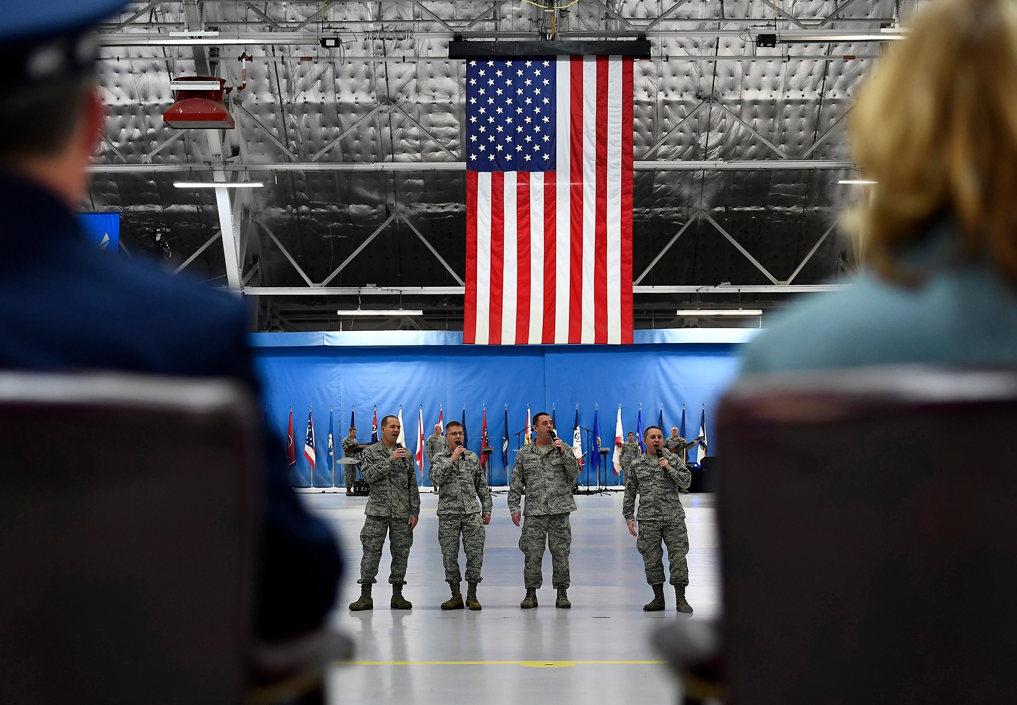 Secretary of the Air Force Deborah Lee James celebrates with Air Force Chief of Staff Gen. David L. Goldfein by watching the Air Force Band's "Max Impact" performance during her farewell ceremony at Joint Base Andrews, Md., Jan. 11, 2017.  James took office as the 23rd secretary of the Air Force in December 2013. (U.S. Air Force photo/Scott M. Ash)