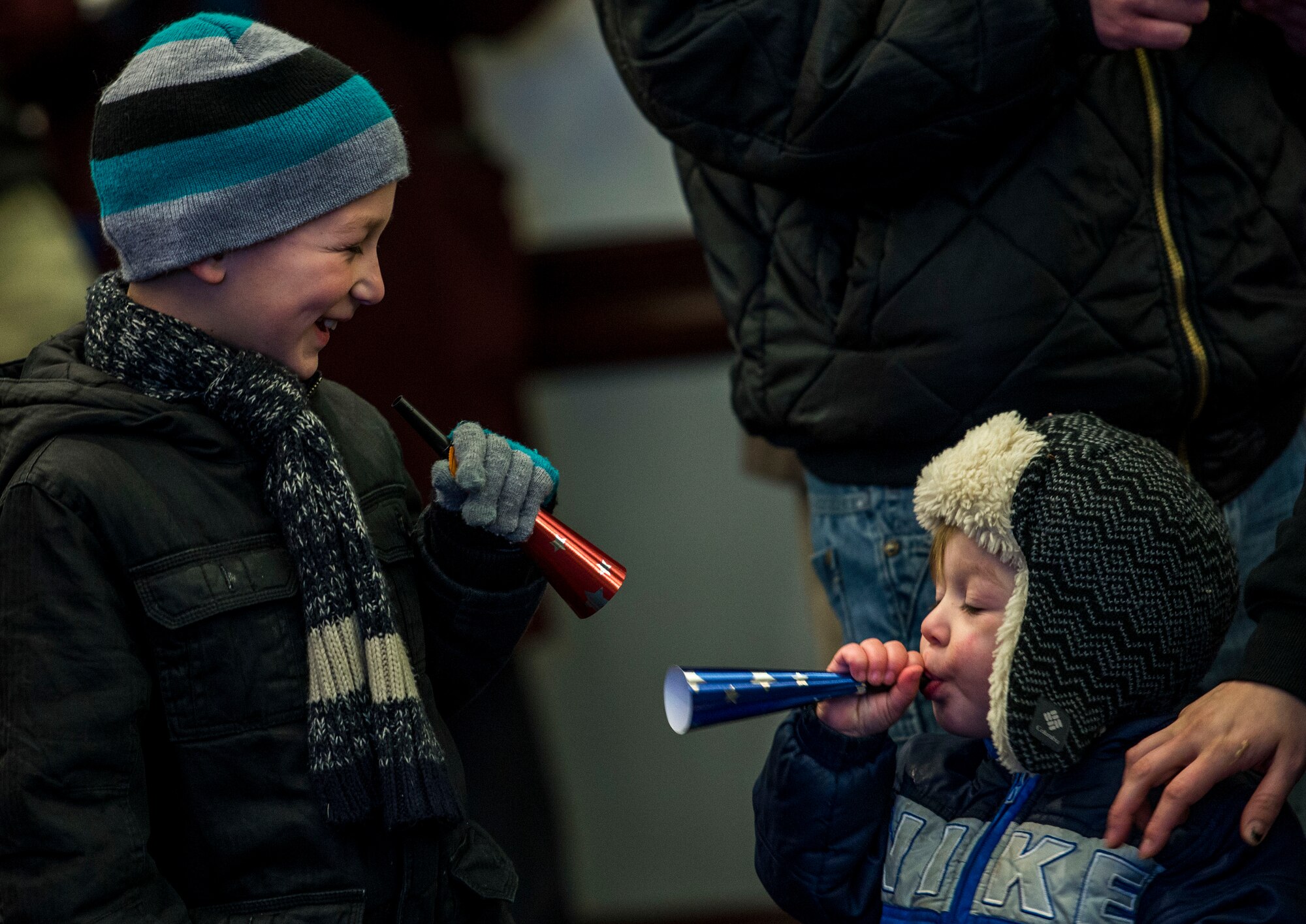 Children celebrate with kazoos for the Scott Air Force Base Centennial kick-off, which celebrates the 100th anniversary of Scott, Scott Air Force Base, Ill., Jan. 6, 2017. (U.S. Air Force photo by Staff Sgt. Jodi Martinez)
