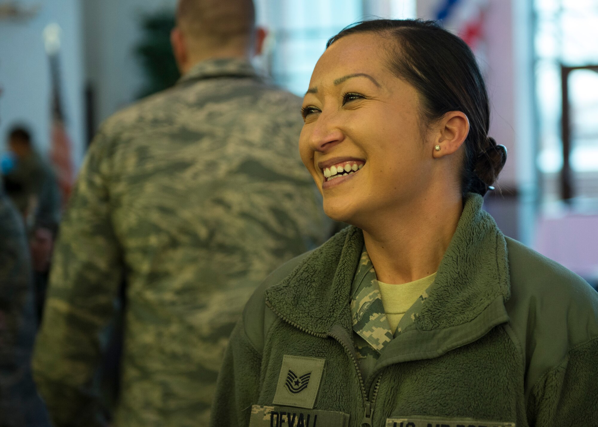 Tech. Sgt. Maryjo Devall, 375th Aerospace Medicine Squadron, enjoys the Centennial kickoff celebration. (U.S. Air Force photo by Staff Sgt. Jodi Martinez)