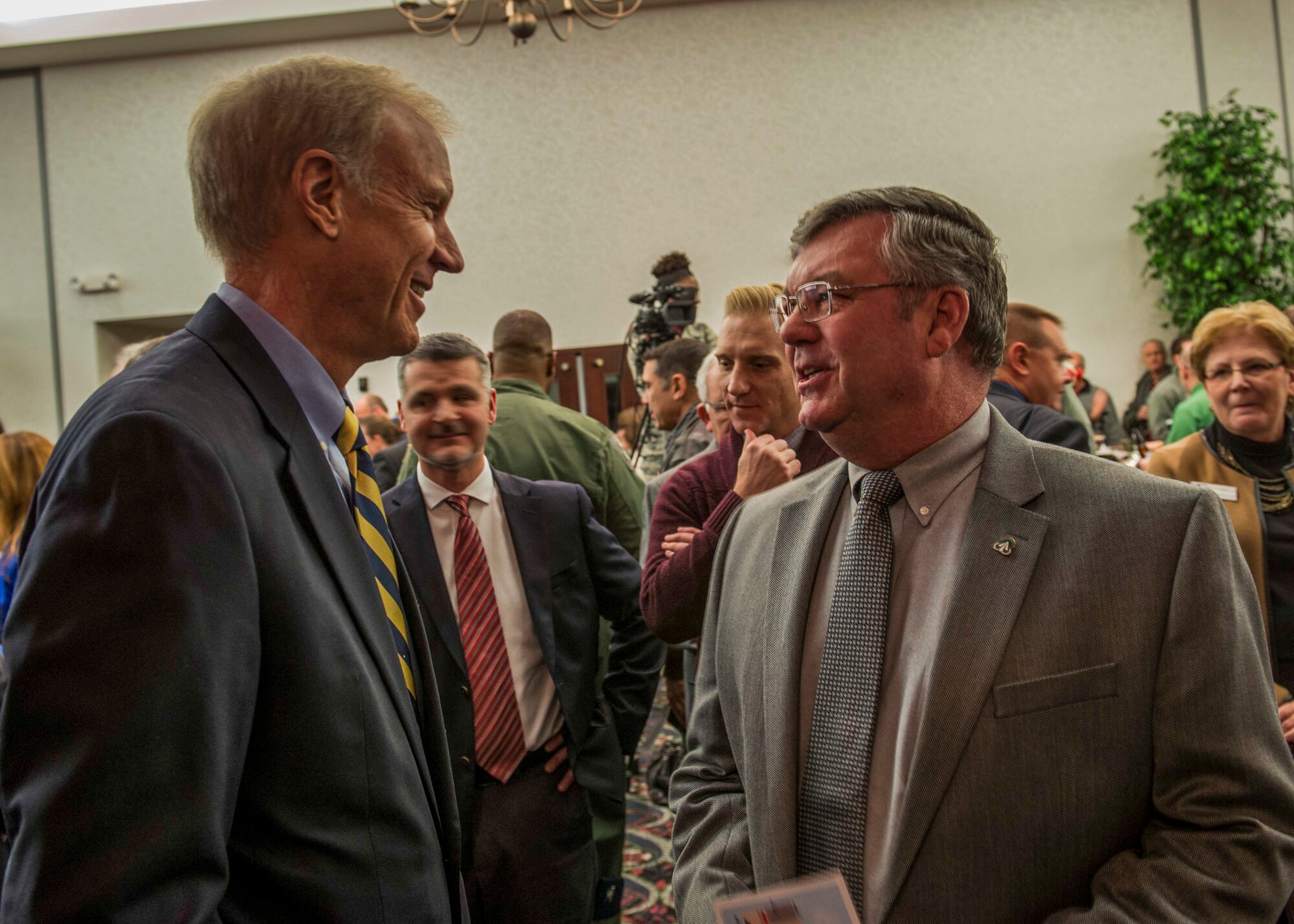 Illinois Governor Bruce Rauner talks to an attendee during Scott Air Force Base's Centennial Kickoff at the Scott Event Center Jan. 6, 2017. During the kickoff Rauner proclaimed 2017 the “Year of Scott Air Force Base”. (U.S. Air Force Photo by Senior Airman Megan Friedl)