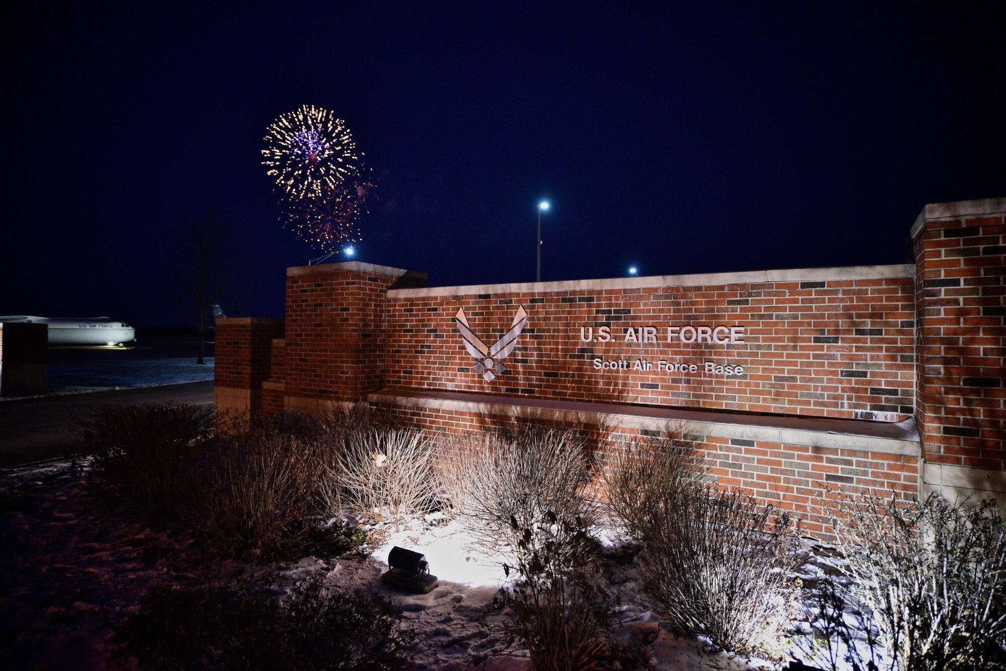 Fireworks explode above the entrance to Scott Air Force Base during the celebration of Scott Air Force Base’s 100th Year Anniversary, Jan. 6, 2017. (U.S. Air Force photo by Chris Parr)