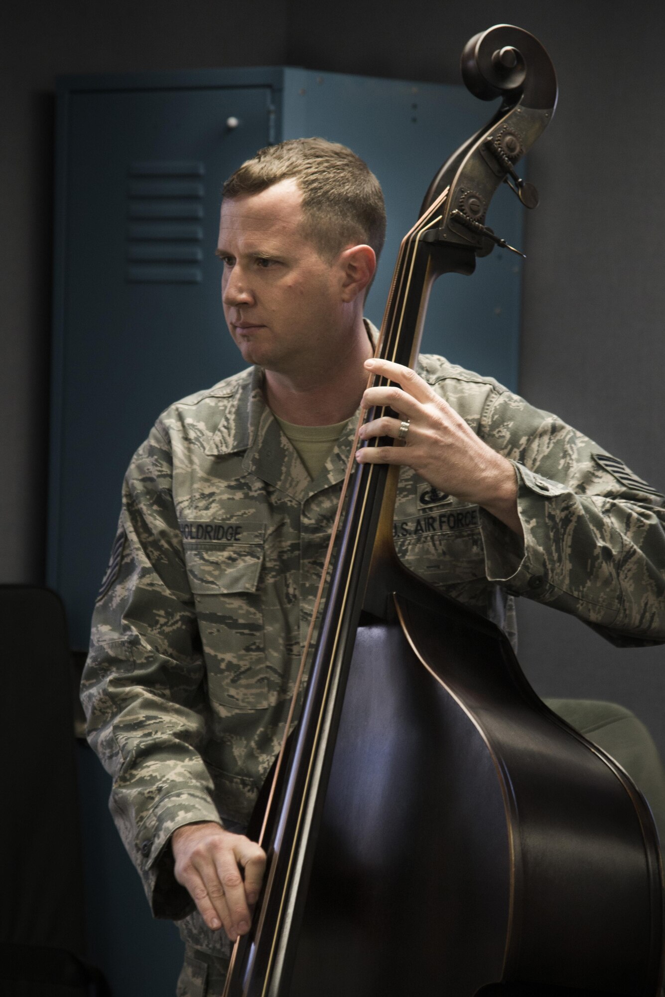Tech. Sgt. Joshua Holdridge, Air Force Band of Mid America Starlifter musician, practices in preparation for Scott Air Force Base’s Centennial Celebration kick off, Jan. 4, 2017 at Scott Air Force Base, Ill.. Formerly known as the Air Force Band of Mid-America, the Military Airlift Command Band, and the AMC Band of Mid-America, the United States Air Force band of Mid-America was established in 1942 at Jefferson Barracks, Mo. (U.S. Air Force photo by Airman 1st Class Gwendalyn Smith)