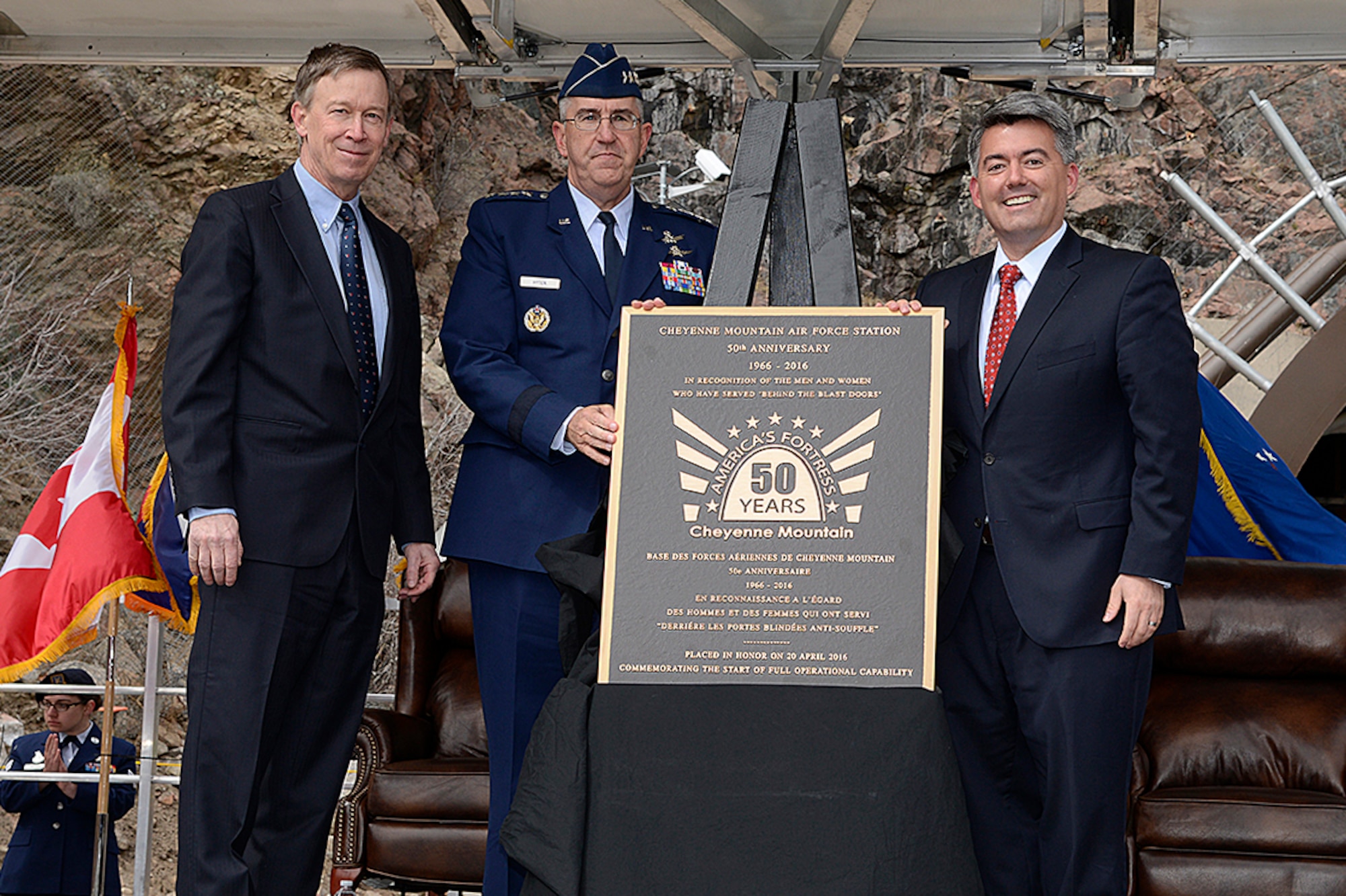 CHEYENNE MOUNTAIN AIR FORCE STATION, Colo. – Colorado Gov. John Hickenlooper, Gen. John Hyten, Air Force Space Command commander, and Colorado Sen. Cory Gardner unveil the 50th Anniversary Rededication Ceremony plaque commemorating 50 years of Cheyenne Mountain Air Force Station, Colo., April 15, 2016. Cheyenne Mountain AFS is owned by the 21st Space Wing at Peterson Air Force Base, and operated by the 721st Mission Support Group. (U.S. Air Force photo by Rob Bussard)